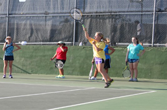 Kids playing tennis at the Georgetown Tennis Center in Georgetown, TX