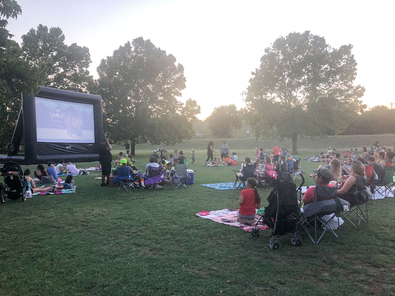 People watching a movie during the Sunset Movie Series in Georgetown, TX
