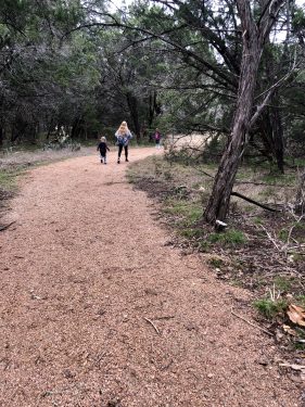 Mother and son hiking at Garey Park in Georgetown, TX
