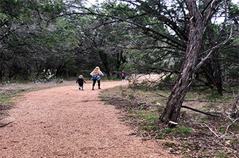 Mother and son hiking at Garey Park in Georgetown, TX